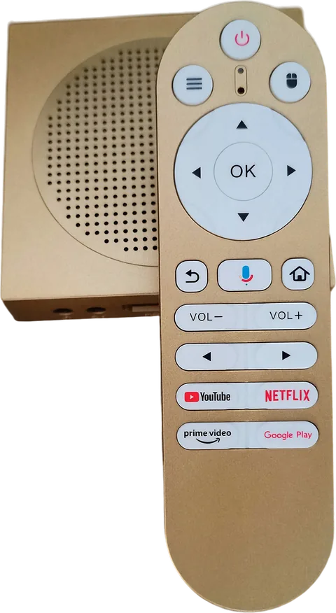 The Bluetooth remote in front of the TV box